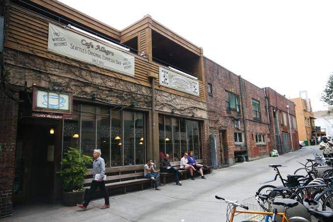 Historic Café Allegro exterior with bicycles and guests